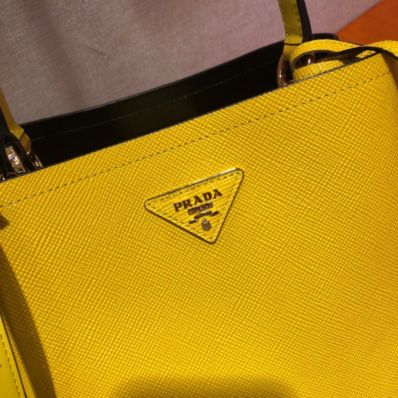 Pra*a top handle bags